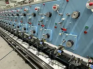 Dispositivo de alimentación de elastano