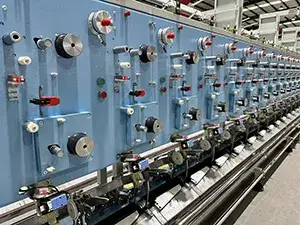 Dispositivo de alimentación de elastano