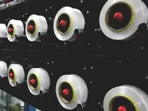 Dispositivo opcional de alimentación de elastano